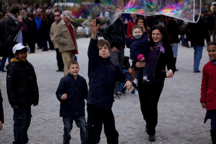 Boy Pops Bubble at the Cathédrale Notre Dame