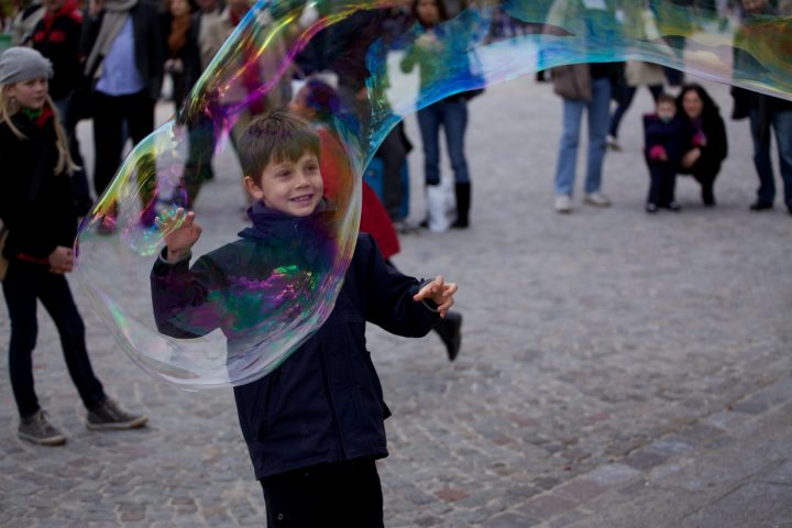 Boy Pops Bubble at the Cathédrale Notre Dame