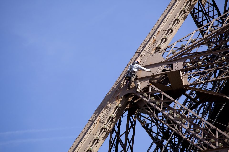 Worker Painting The Eiffel Tower