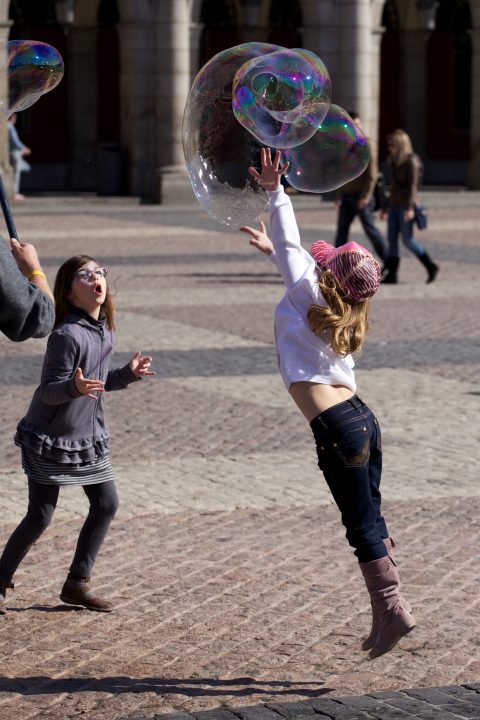 Kids Chasing Bubbles
