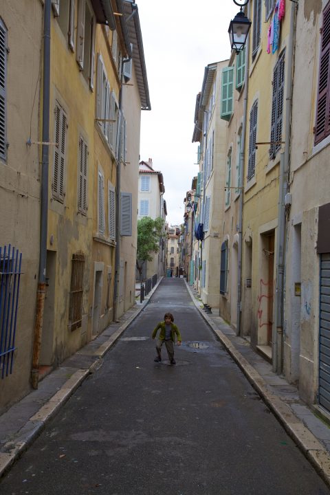 Boy Playing in the Street