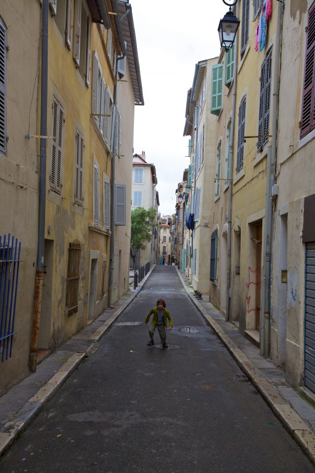 Boy Playing in the Street
