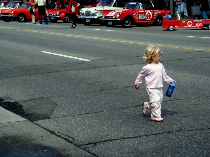 Cute Girl and Red Cars