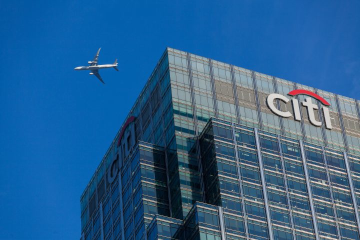Airplane Flying Over Citibank Canary Wharf London