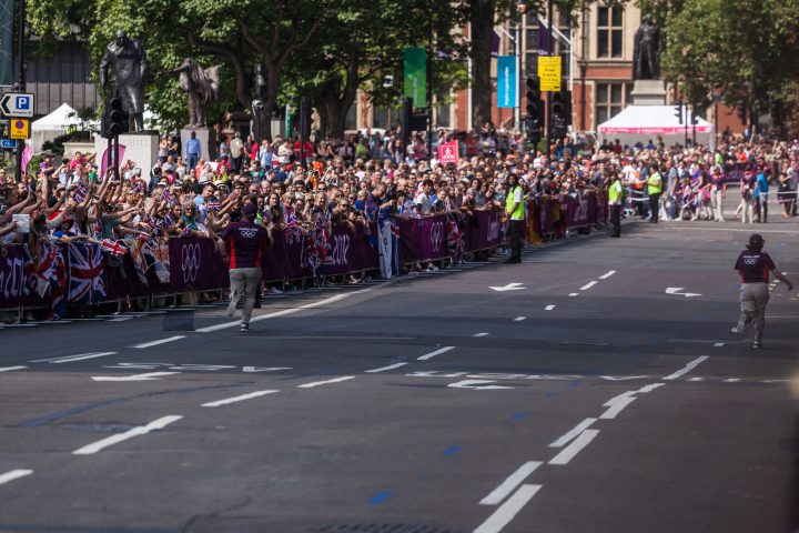 Gamesmakers Volunteers Starting the Mexican Wave at Marathon London 2012 Olympics 0395