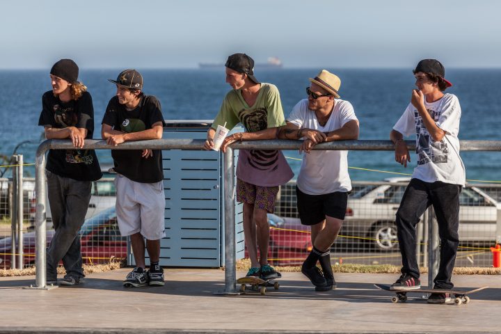 Young Men Watch Skaters Merewether Australia