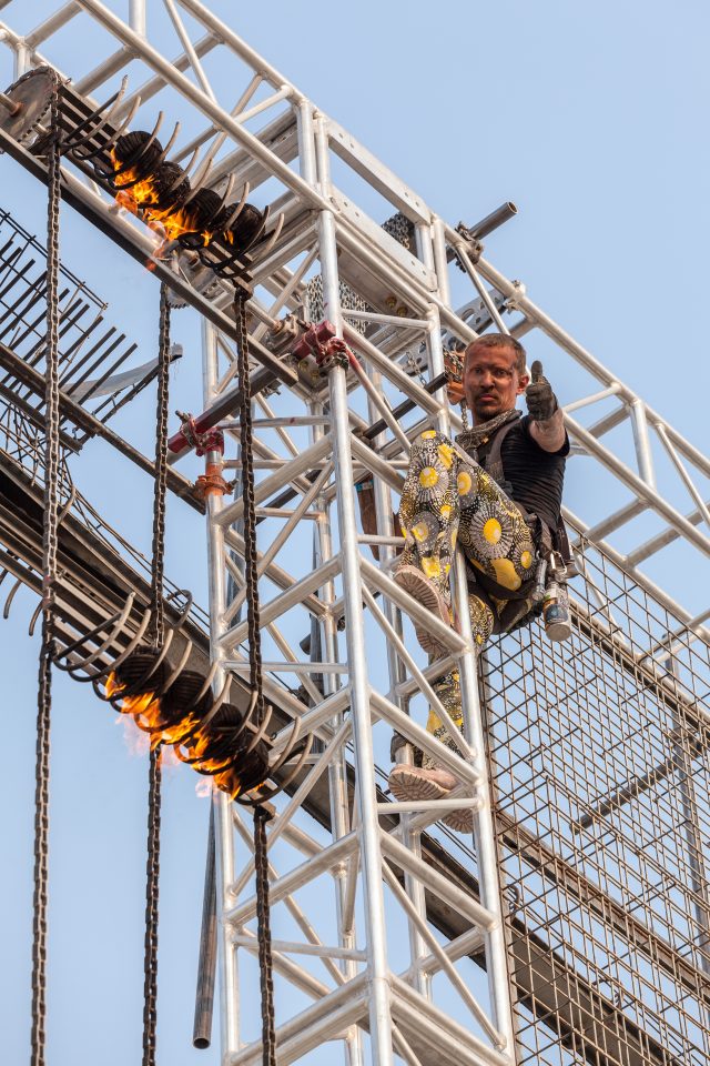 Jay Mingle Climbs The Giant Flaming Pachinko Machine Burning Man 2013