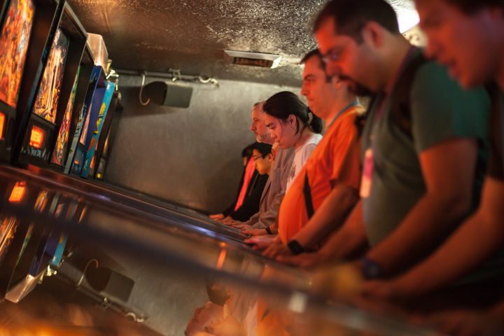 People Playing Pinball XOXO 2013