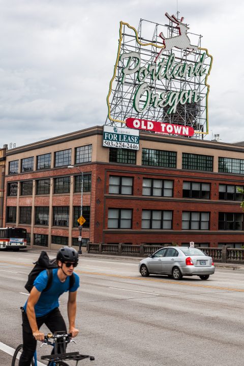 Portland Oregon Old Town Sign and Cyclist XOXO 2013