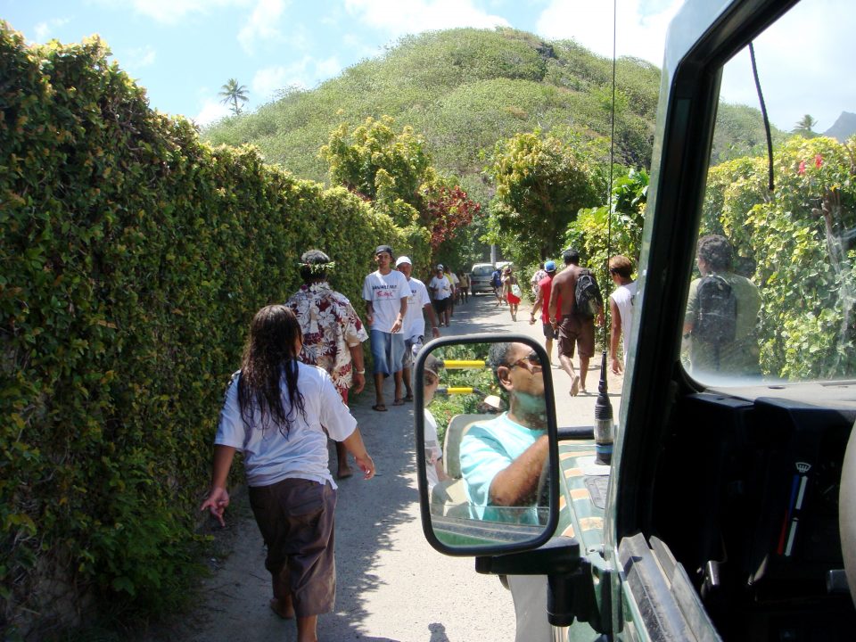 people on the road in tahiti