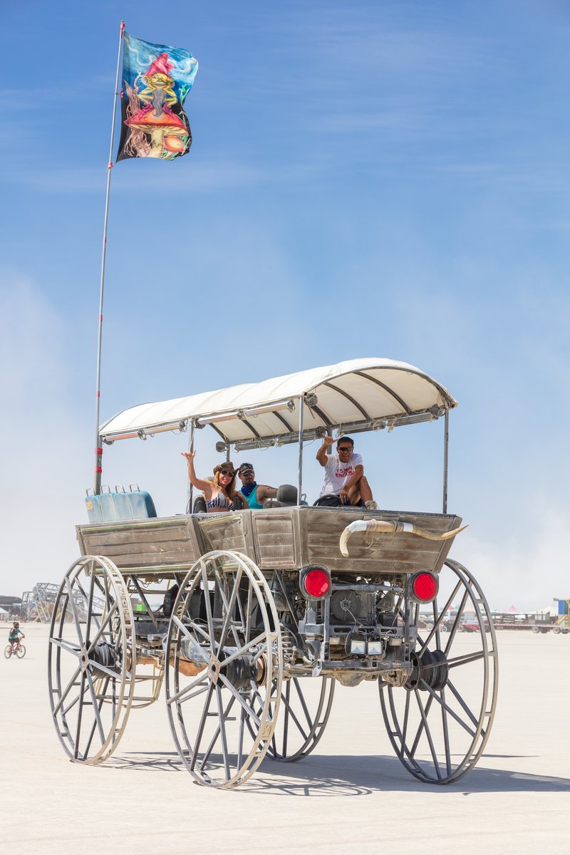 I see these friendly folks every year and I always forget the name of their amazing vehicle. Name unknown.