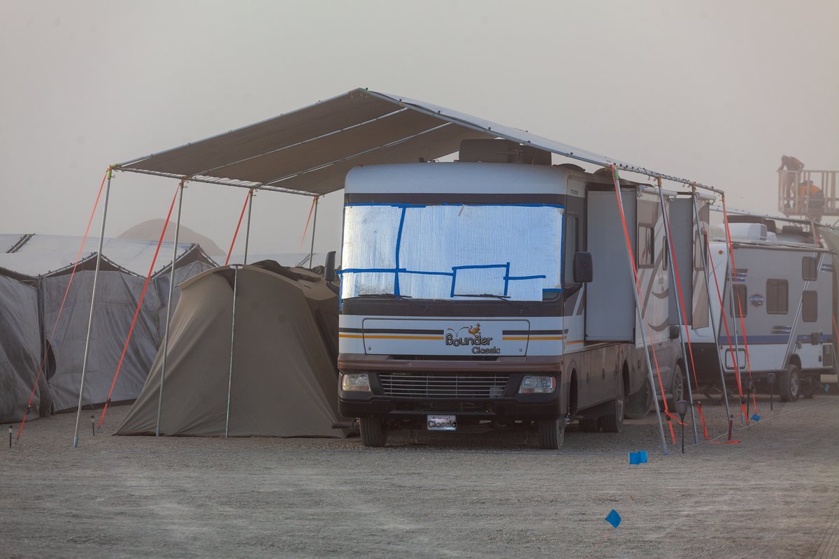 Impressive shade structure over a big RV.