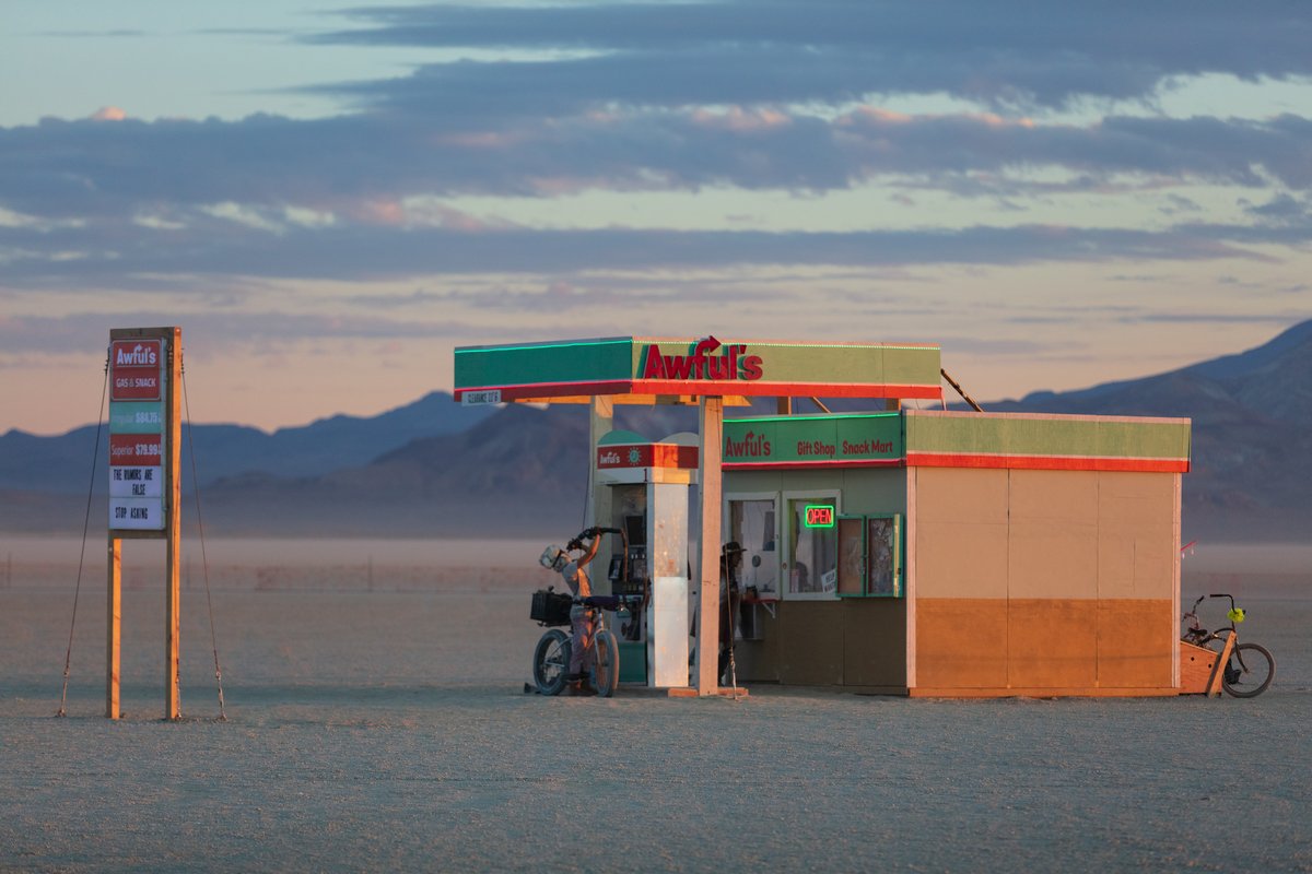 Drinking from the gas pump at Awful's Gas & Snack