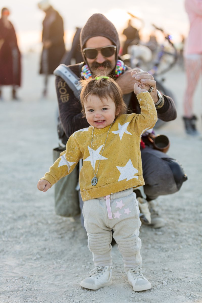 One of my favorite moments from the burn was when this little one came to me and reached out her hand. She was just learning to walk and was curious about my camera. She grabbed my hand and played with all the buttons on my camera! It was so such a sweet little moment.