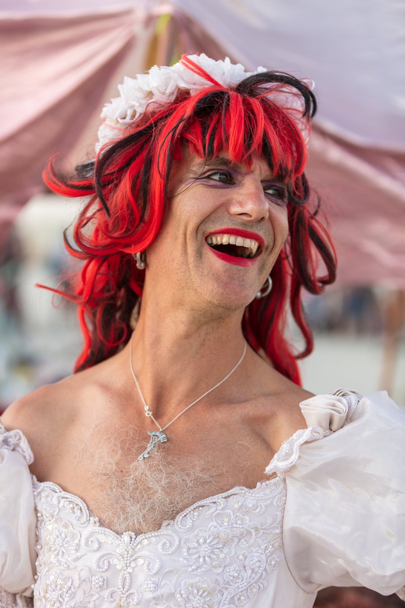 This bride was looking for a bottle opener. I always carry a multitool on me so I opened the bottle. Then we made htis image.