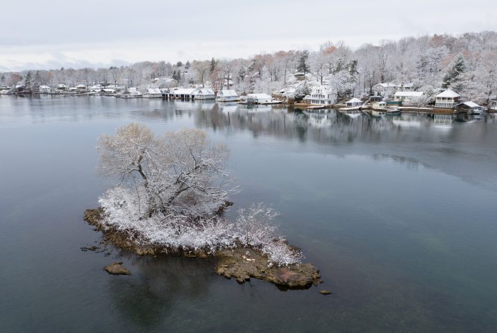 Small Snow Covered Island and Cottages