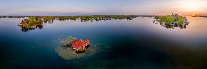 Small Red Cottage and Castle at Sunrise