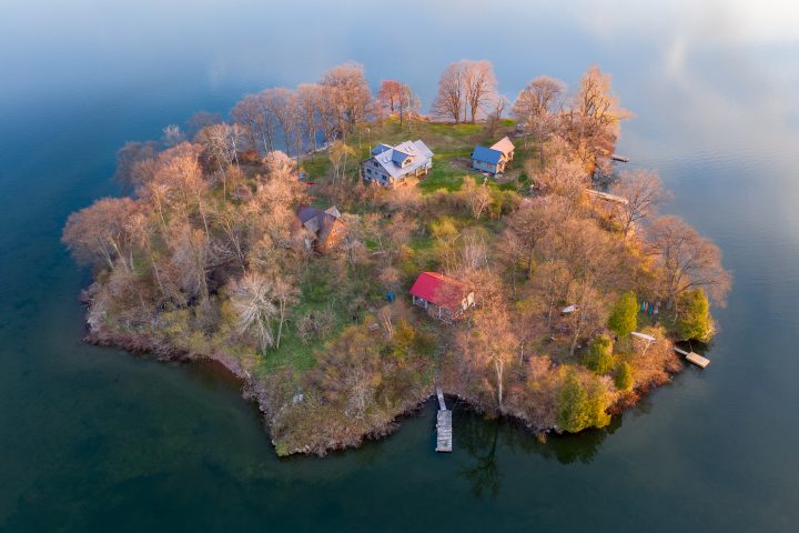 Island With Multiple Cottages at Dusk