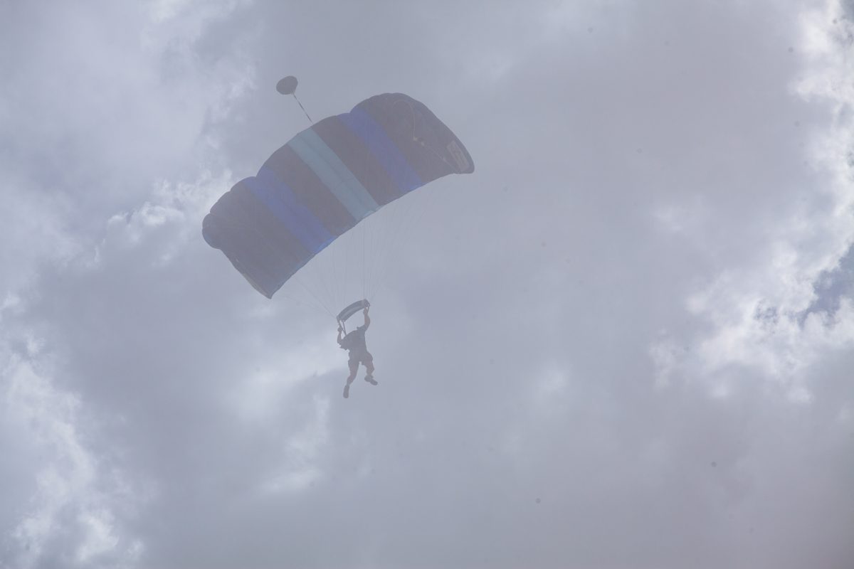 Skydiver landing in the dust