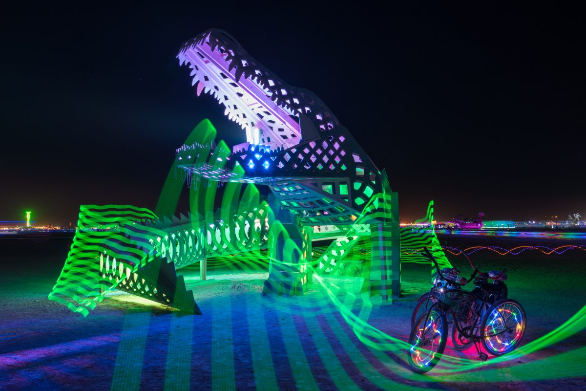 Lil Al from: New Orleans, LA year: 2015 (with light painting by me)  Lil Al is a A 60′ long roaring wooden alligator effigy and symbol of the NOLA burners coming together as a community. It's a group effort that raises awareness of our love for each other, Mardi Gras, and Burning Man. The first r...