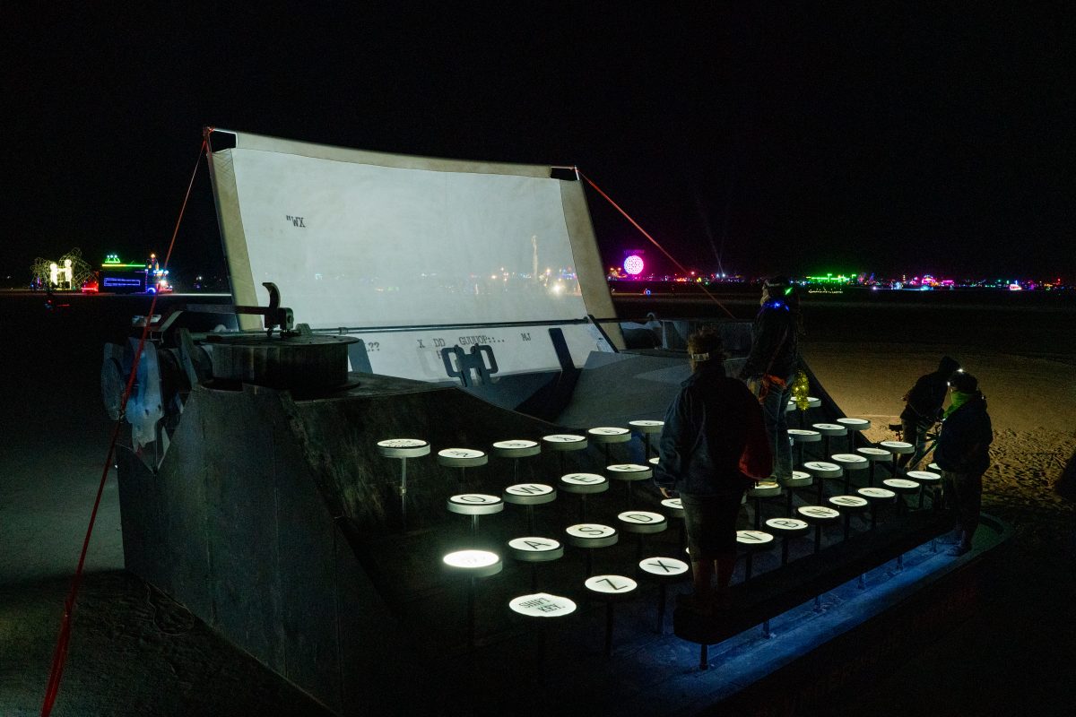 Blunderwood Portable from: Boston, MA year: 2015  A giant, climbable typewriter with a shaded hangout space. The keys have sensors that drive projections of letters on a "paper" screen. Each day we will place a new physical poem, 16' wide by 40' long, next to the typewriter. It will mel...