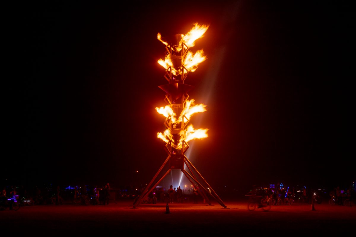 Spire of Fire from: Reno, NV year: 2016  The Spire of Fire is a work of fire art that stands grand and high on the expanse of the open landscape much like a skyscraper in a metropolis. The tower's height, geometry, metal textures are designed to reflect the evolution of modern metropolitan archit...