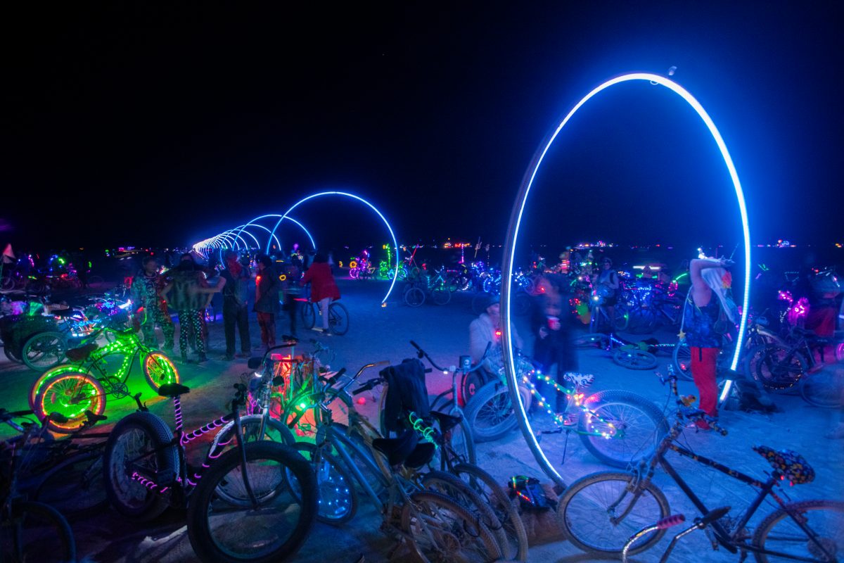 Sonic Runway from: Berkeley, CA year: 2016  Imagine sound speeding across the desert as light. The Sonic Runway is a 1000 ft corridor of lights that visualizes the speed of sound. Participants, especially sound art cars, are encouraged to play music or make other sounds at one end. This triggers ...