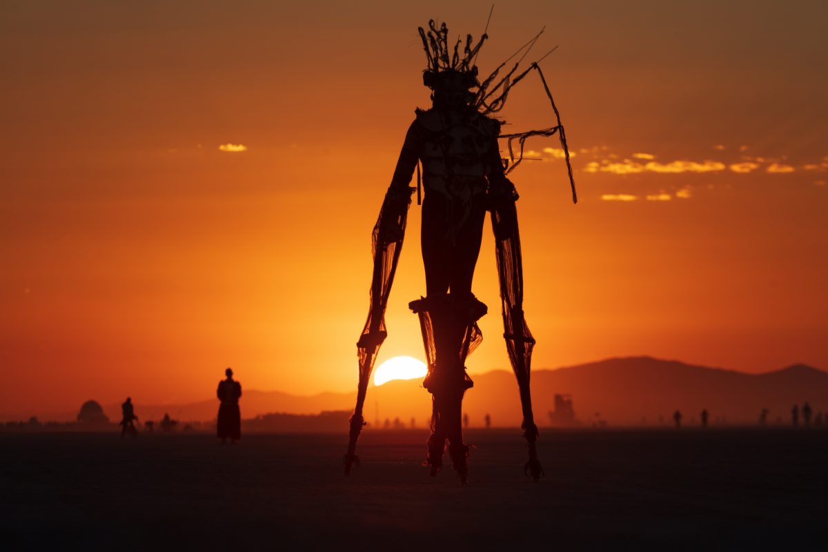 Burner with spectacular costume at sunrise.