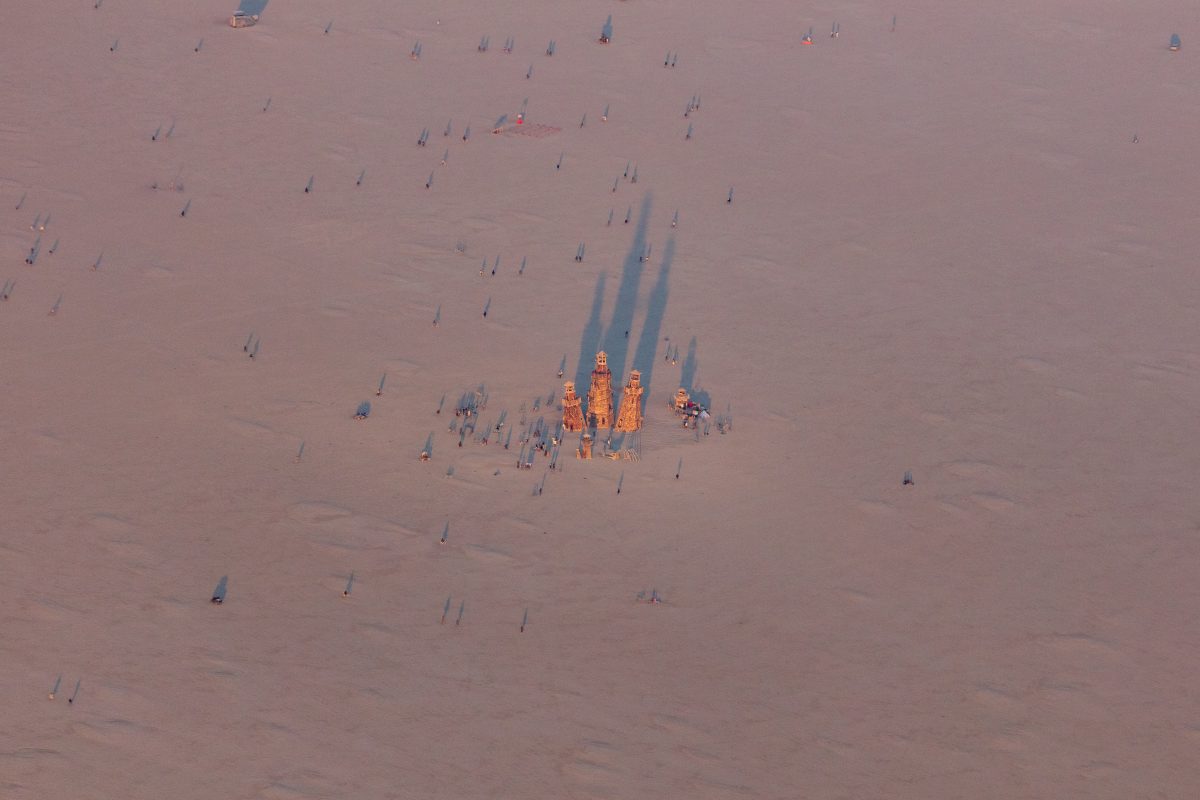 Aerial Photo of The Black Rock Lighthouse Service from: Oakland, CA year: 2016  A crystal like cluster of Lighthouses ranging from 6 to 60 foot tall and some leaning as much as 20 degrees. Inspired by the juxtaposition of creating a destination of fun and shelter by something that is meant to war...