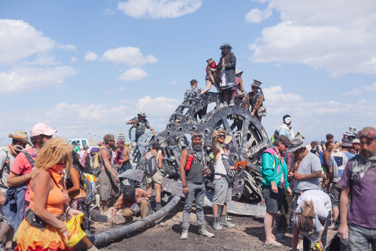 Burners explore the debris and ashes the morning after the Man Burn 2016.