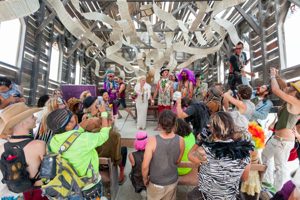 Wedding at the Church Trap by: Rebekah Waites from: lakewood, CA year: 2013  Church Trap is an interactive wonderland for the religiously rebellious. A large-scale decaying church, tipped on its axis like a box trap. Not only does it push participants to ask the question "why", but it a...
