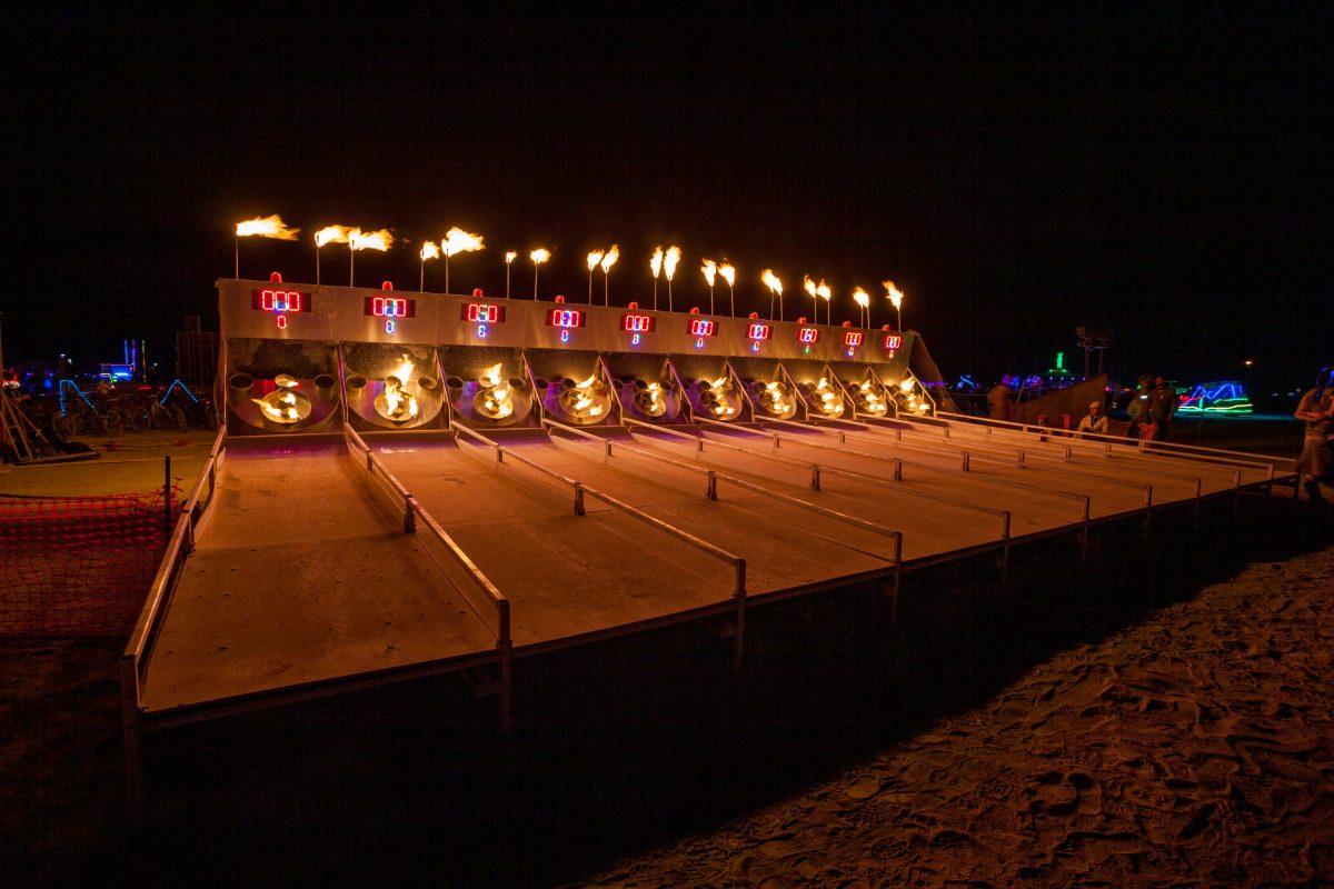 Skeeball Or Riskee Ball (created by Christopher Guard & Site 3 coLaboratory) Every community needs an arcade, but for Black Rock City, not just any arcade will do. That's why we've dreamed up the Charcade, where past and present interactive fire art and game installations come together to cre...