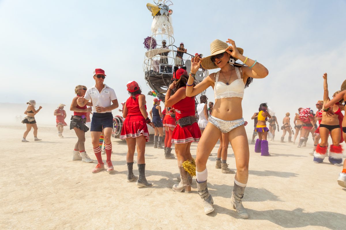 Burners dance around the Giant Cock Mutant Vehicle. These folks are super fun!