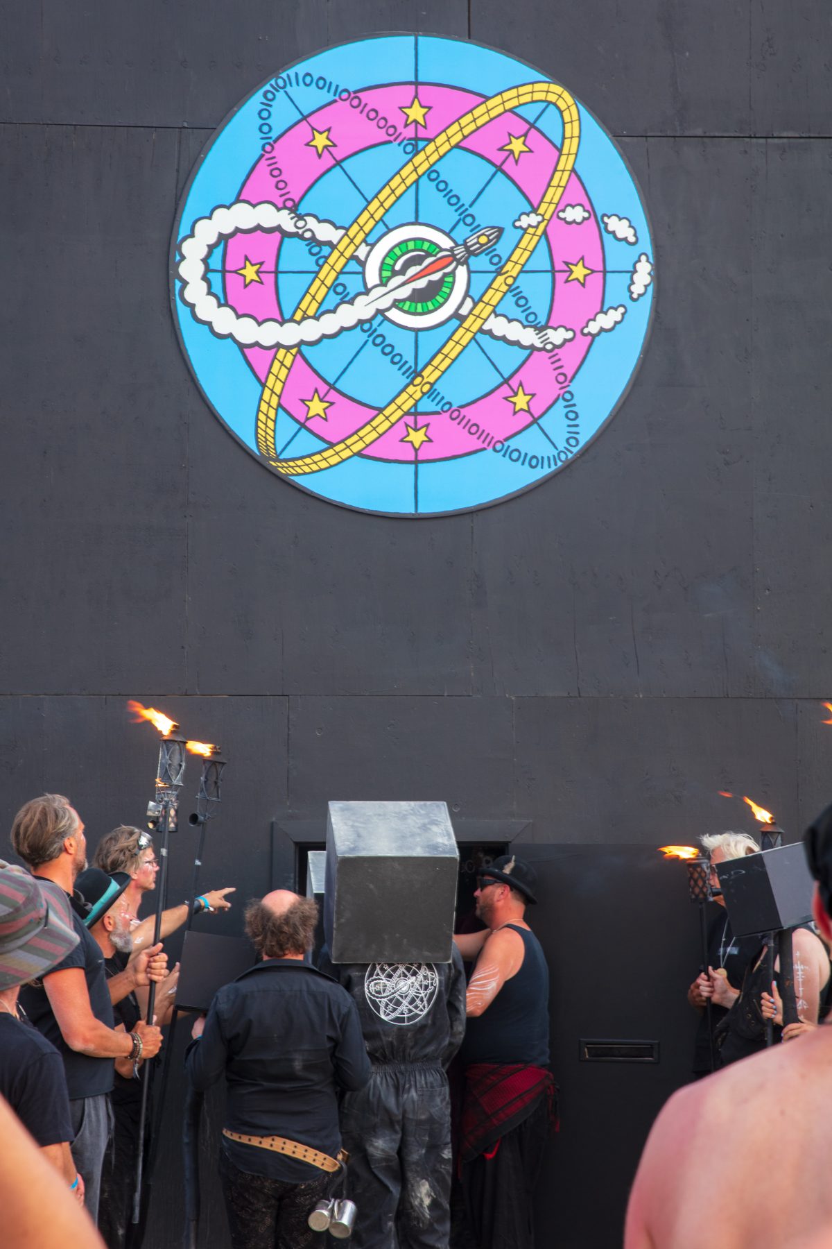 Solipmission - An Initiation Into Future Realities by: Dadara from: Amsterdam, Netherlands year: 2017  A small crew of artists will be locked up inside a black box for the entire week of the event. They will create a virtual Burning Man on the inside walls without ever viewing the outside, just b...