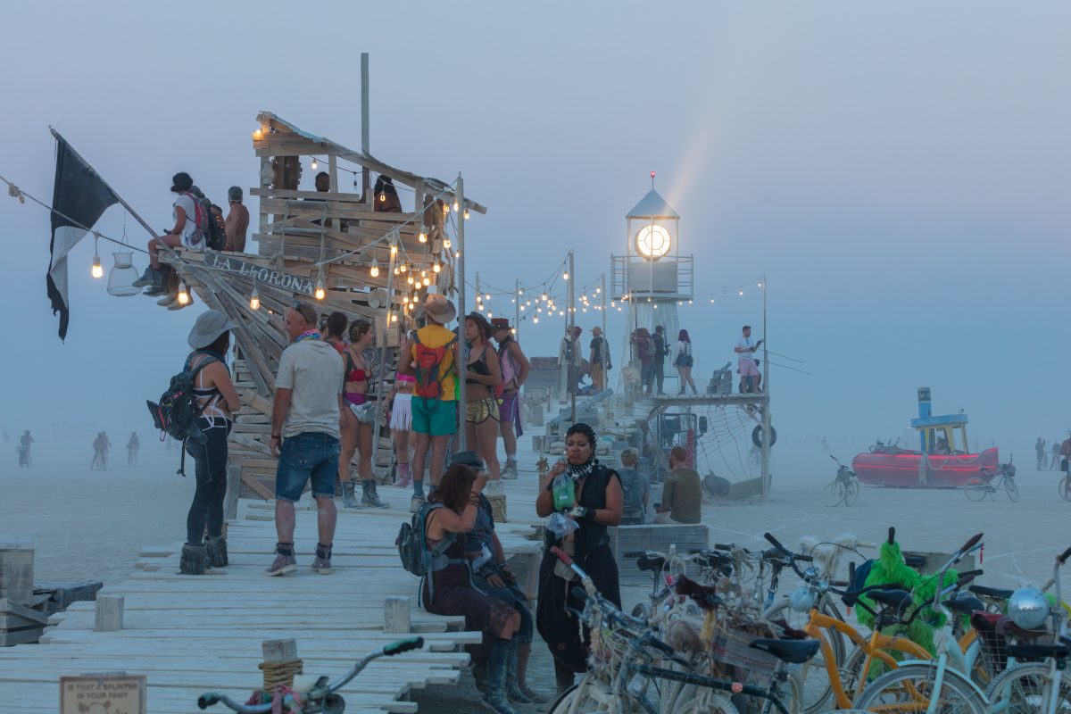 The Pier, A Lighthouse, and a Boat
