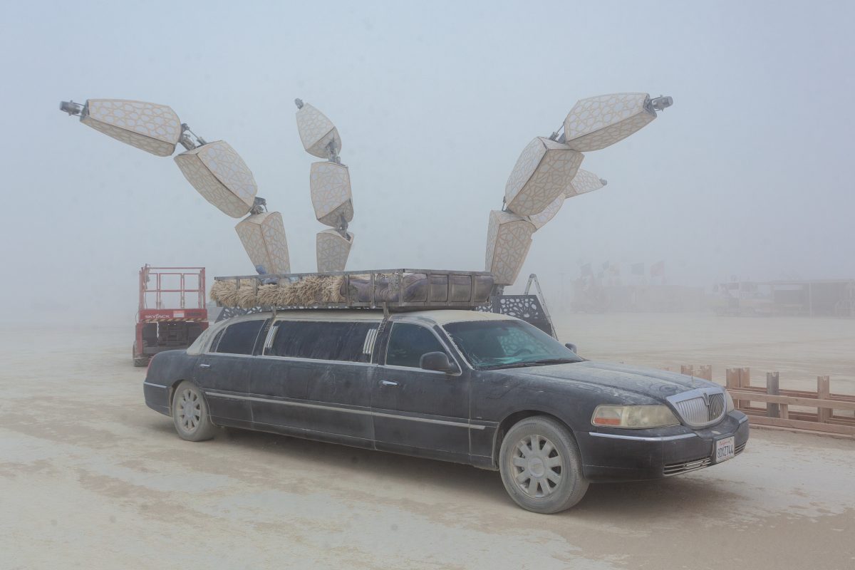 Limo and CROWN by: Charles Gadeken from: San Francisco, CA year: 2018  CROWN creates a space for shared experience with its gigantic scale, riotous light show, and impressive kinetic motion. My mission with this piece is mass hypnosis, wonder, and delight. It will be terrifyingly awesome! Four pr...