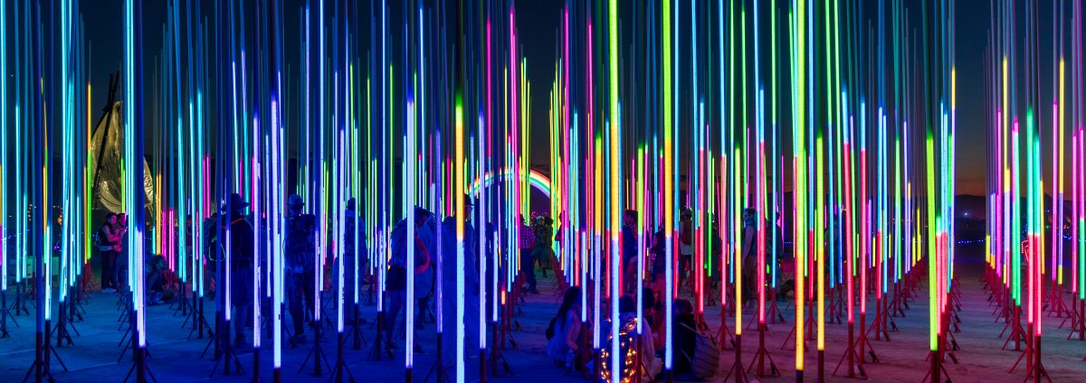 Hexatron by: Mark Lottor from: Menlo Park, CA year: 2018 A forest of 486 20ft tall LED light poles, arranged in a hexagon shape of approximately 90ft diameter, displaying 3D computer contr'd effects.
