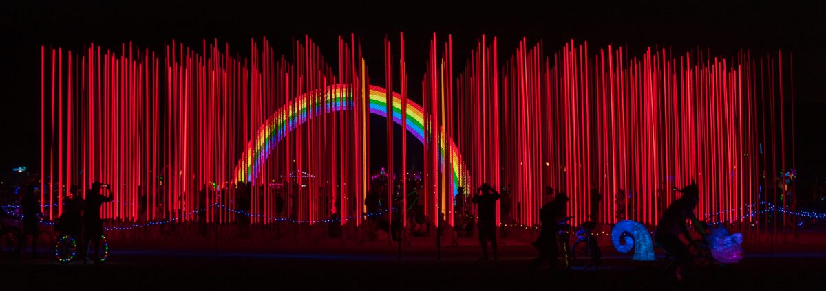 Hexatron by: Mark Lottor from: Menlo Park, CA year: 2018 A forest of 486 20ft tall LED light poles, arranged in a hexagon shape of approximately 90ft diameter, displaying 3D computer contr'd effects.