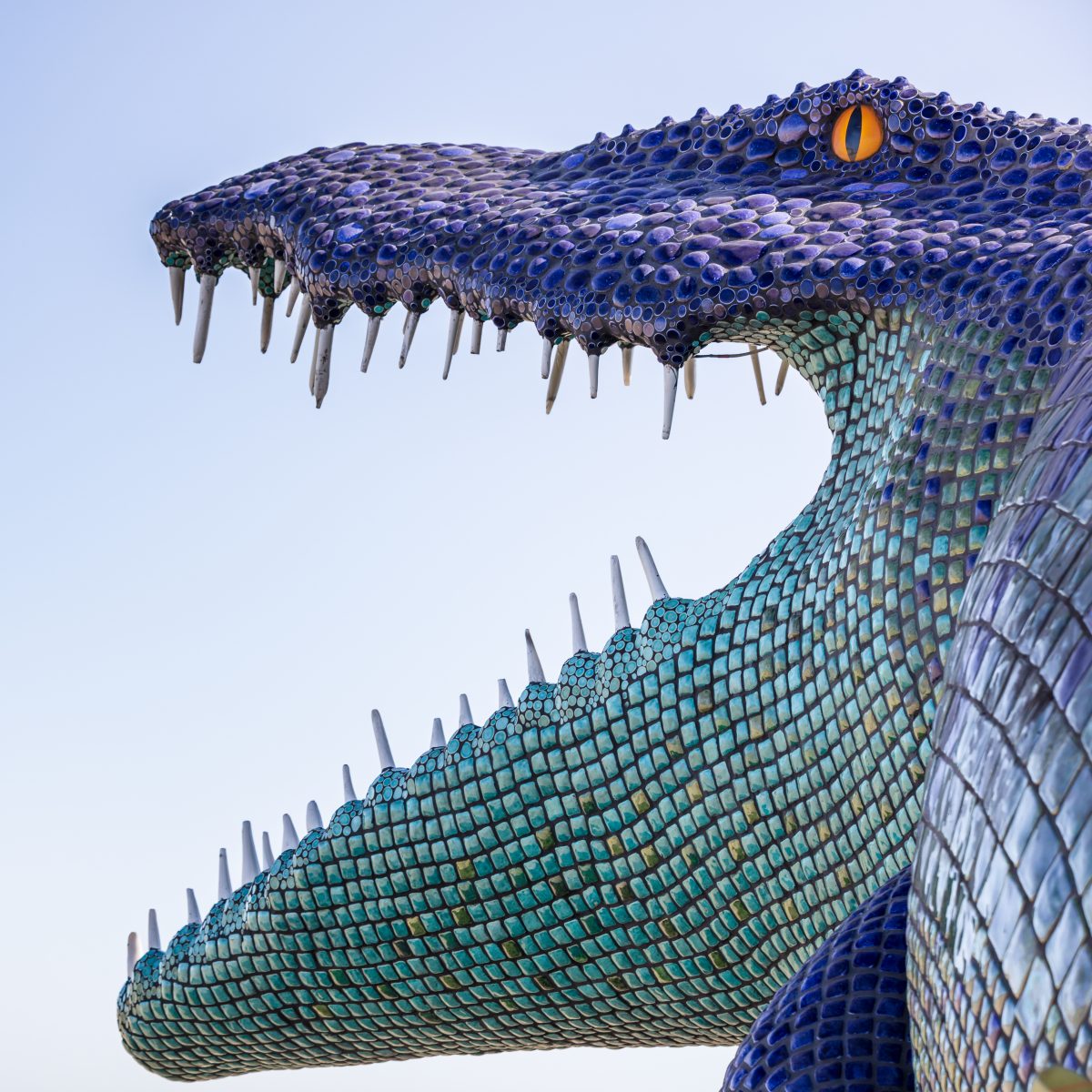 Niloticus by: Peter Hazel from: Reno, NV year: 2019 Niloticus is a 40 foot long mosaic crocodile that invites visitors to climb on top of him. His eyes, teeth, and osteoderms will light up in the night. Contact: peter@peterhazel.com https://burningman.org/event/brc/2019-art-installations/?yyyy=&a...