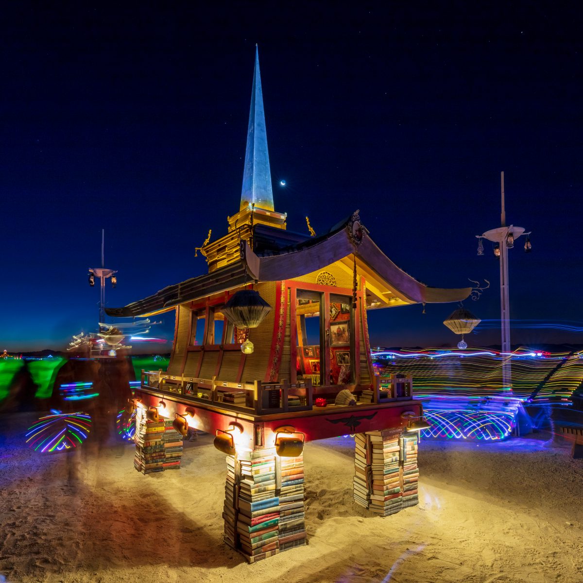 The Larry Memorial by: Dana Albany, Andrew Johnstone, David Best, Flash Hopkins from: San Francisco, CA year: 2019  A stepped pyramid crowned with a palanquin and large spire, flanked on each corner by lamplighter spires. It serves as a physical representation of Larry's mind palace and contains ...