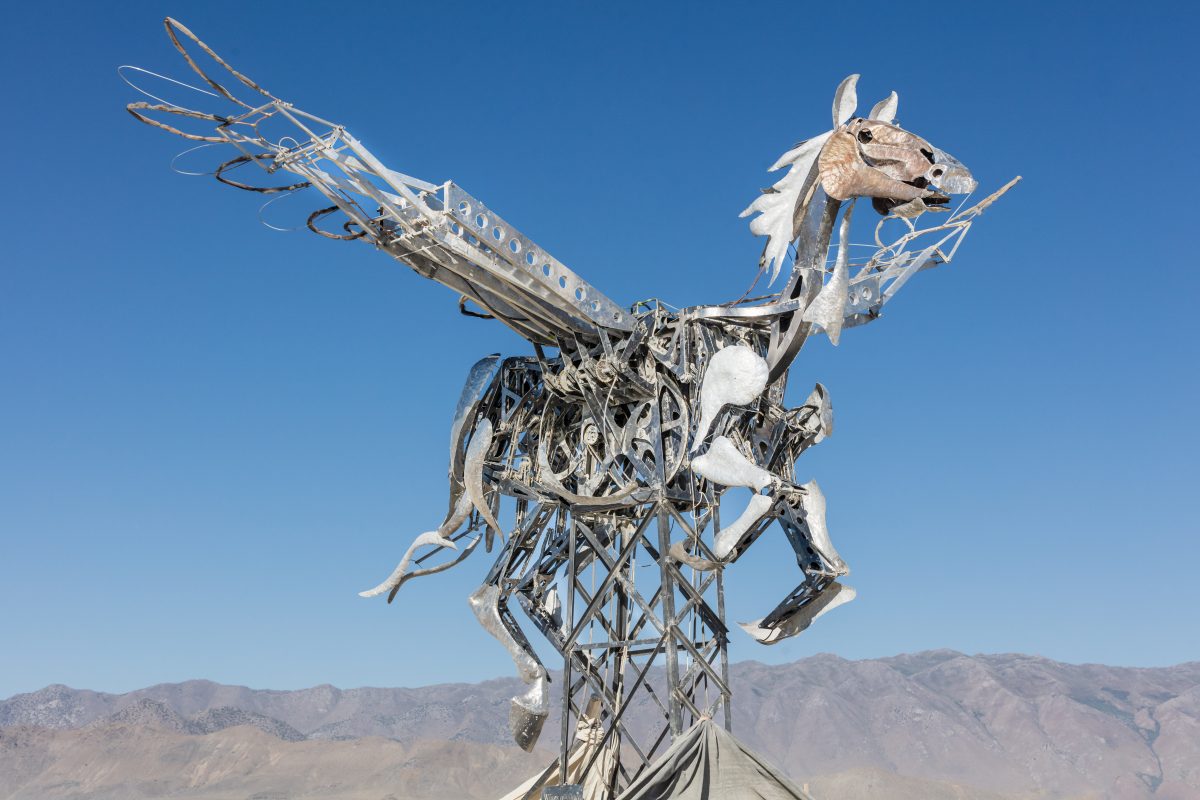 Wings of Glory by: Adrian Landon and the Dusty Sparks from: New York City, NY year: 2019  Wings of Glory is a giant mechanical metal Pegasus sculpture, flying in the air. It is the expression and embodiment of pure, epic, beautiful and awesome creativity of New York based artist, Adrian Landon, a...
