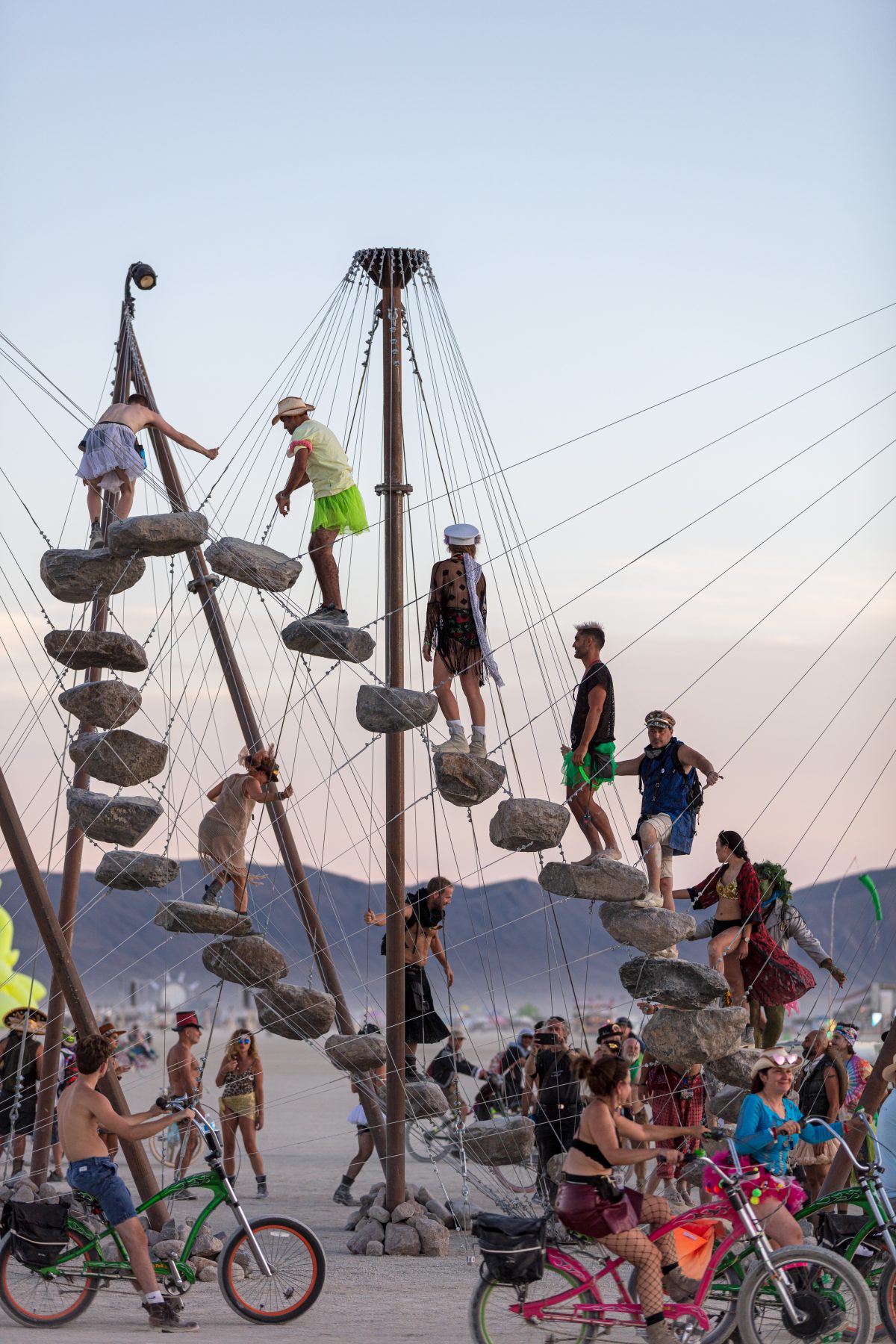Stone 27 by: Benjamin Langholz from: California & Berlin, Germany year: 2019  Confront nature and yourself as you journey along 27 stones floating above the Playa. Step into an alternate reality where destructive energy has been harmonized with nature to create moments of physical and mental ...
