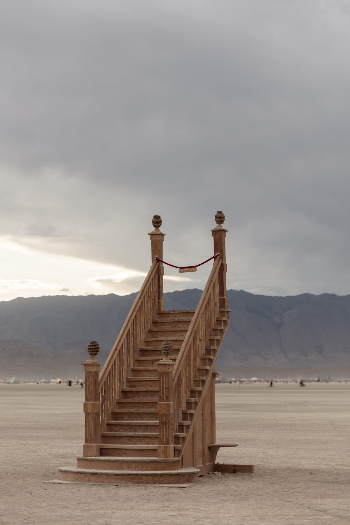 Pauper's Ballroom by: Pedro Loughran from: Sebastopol, CA year: 2019  A Pauper's Ballroom is what our parents tell us when walking down to a beach, a clearing or any other beautiful place in nature. A palace free to all. A pauper's ballroom. The piece is a grand staircase with no second floor, fr...
