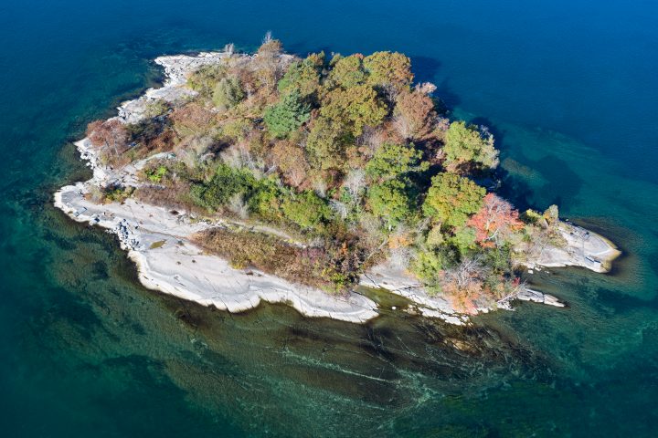 Small Island With Rocky Shoreline