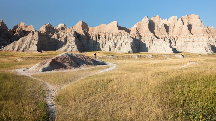 Hiker Exploring Badlands