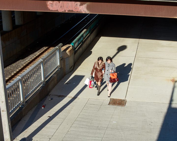 Friends Walking and Holding Each Other