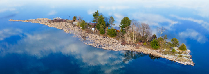 Elongated Island and Cloud Reflection