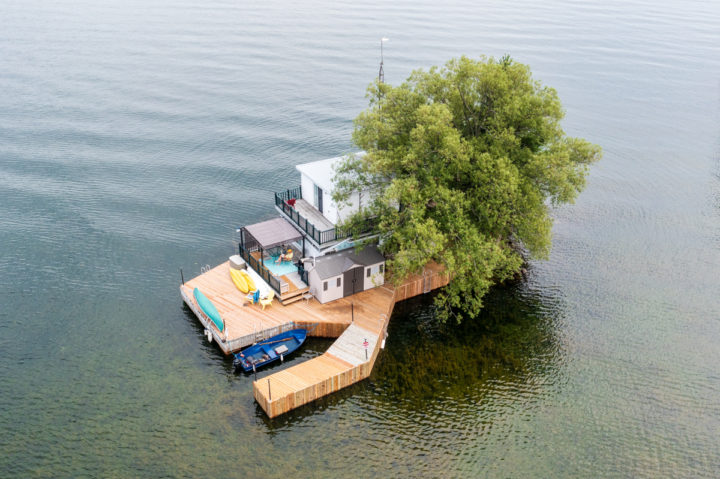 Person Reading on Small Island