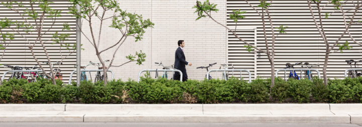 Man in Suit and Bike Racks