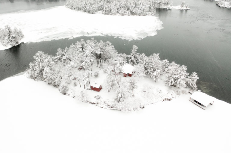 Island with Red Cottage in the Snow